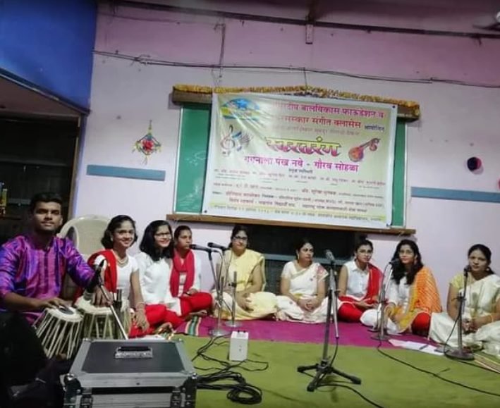 Tabla and vocal ensemble performing on stage